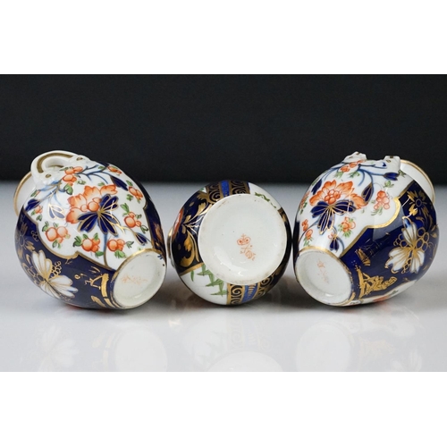 17 - Group of Early 19th Century Crown Derby Imari pattern ceramics, to include two saucers, a pair of mi... 