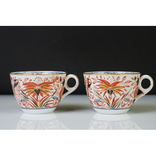 17 - Group of Early 19th Century Crown Derby Imari pattern ceramics, to include two saucers, a pair of mi... 