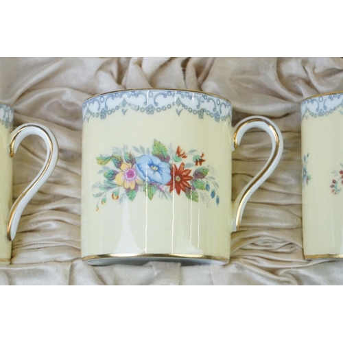 19 - Shelley Boxed Yellow ' Crochet' pattern coffee set, to include six coffee cans and saucers, with flo... 