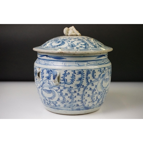 23 - Chinese porcelain lidded jar, decorated in blue and white with scrolling foliate decoration, incompl... 