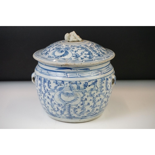 23 - Chinese porcelain lidded jar, decorated in blue and white with scrolling foliate decoration, incompl... 