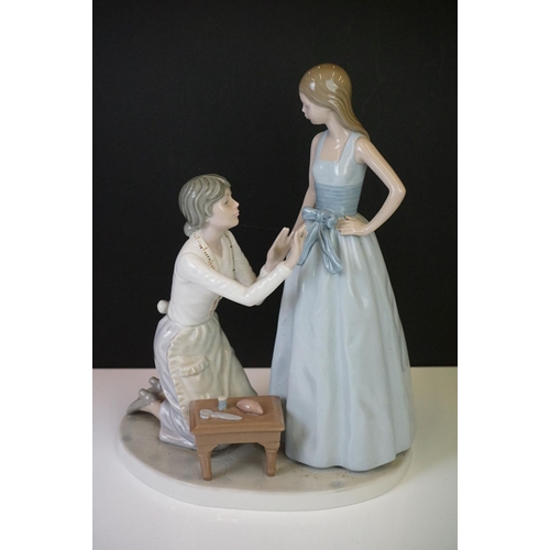 27 - Six Nao by Lladro porcelain figures to include a girl with a goat (29.5cm high), a tailor and a youn... 