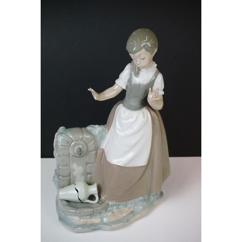 27 - Six Nao by Lladro porcelain figures to include a girl with a goat (29.5cm high), a tailor and a youn... 