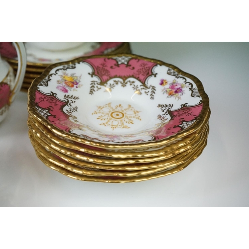 29 - Coalport Pink Batwing Tea Set, circa 1891-1919, to include six teacups & saucers, 6 tea plates, a mi... 