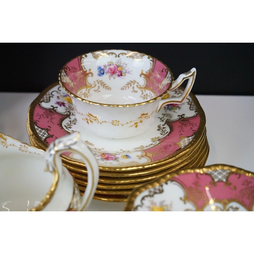 29 - Coalport Pink Batwing Tea Set, circa 1891-1919, to include six teacups & saucers, 6 tea plates, a mi... 