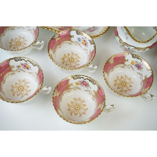 29 - Coalport Pink Batwing Tea Set, circa 1891-1919, to include six teacups & saucers, 6 tea plates, a mi... 