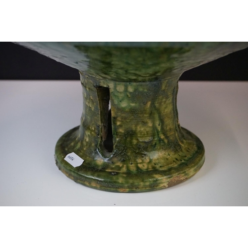 35 - Large French Artisan green glazed pottery circular footed bowl of conical form, 41cm diameter