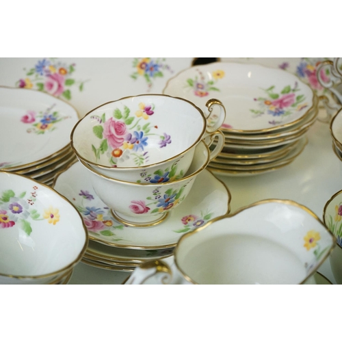 40 - Early 20th Century Hand Painted tea service with floral design on a white ground and gilt rims, to i... 