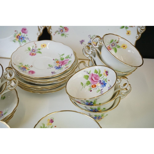 40 - Early 20th Century Hand Painted tea service with floral design on a white ground and gilt rims, to i... 