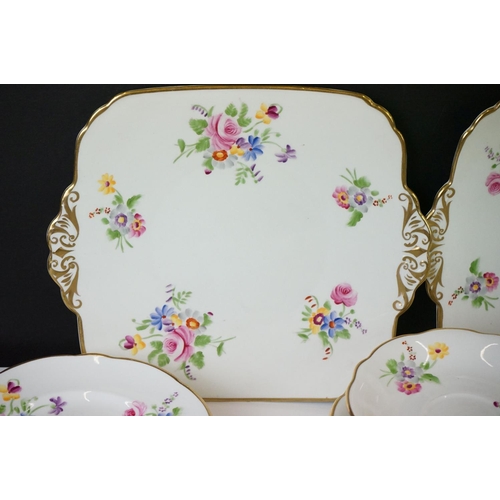 40 - Early 20th Century Hand Painted tea service with floral design on a white ground and gilt rims, to i... 