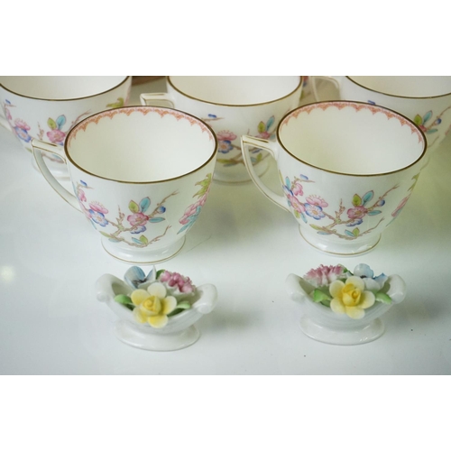 41 - Mintons porcelain tea service decorated with songbirds amongst peonies, to include 6 teacups & sauce... 