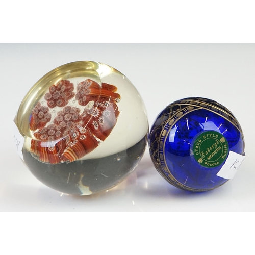 62 - A millefiori glass paperweight of mushroom shape, with a central cluster of eight canes flanked by s... 