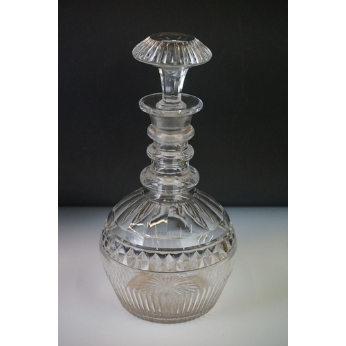 80 - Three cut glass decanters with star-cut bases to include two in the form of ewers and another with a... 