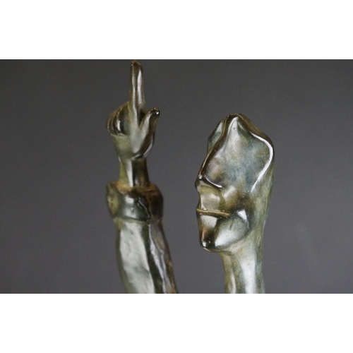 116 - Israeli bronzed metal sculpture of a stylised figure balancing on one hand, signed and dated 1989, 2... 