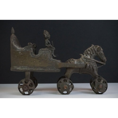 123 - Indian Cast Metal Horse and Carriage sculpture with a Hindu figure riding on the carriage and moveab... 