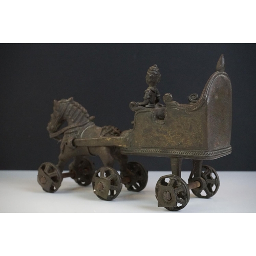 123 - Indian Cast Metal Horse and Carriage sculpture with a Hindu figure riding on the carriage and moveab... 