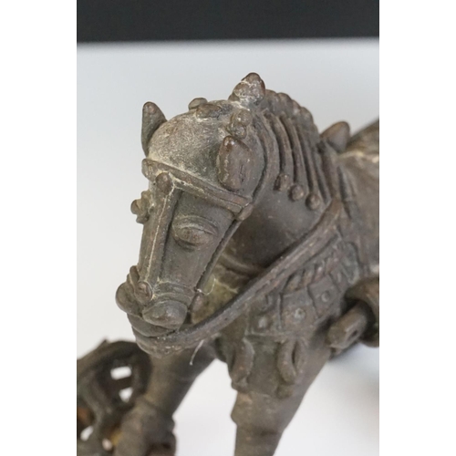 123 - Indian Cast Metal Horse and Carriage sculpture with a Hindu figure riding on the carriage and moveab... 