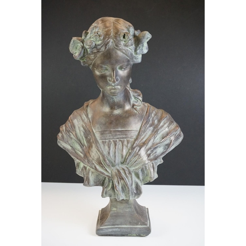 126 - A terracotta bust of a lady of classical form in robed dress, with mock Verdigris finish, raised on ... 