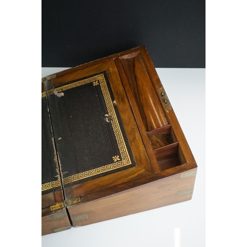 133 - 19th century wooden and brass bound writing slope with brass escutcheon, 35cm wide