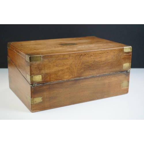 133 - 19th century wooden and brass bound writing slope with brass escutcheon, 35cm wide