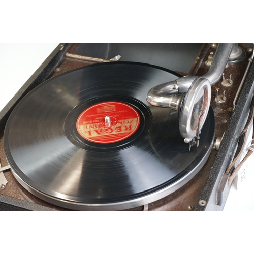 136 - HMV ' His Masters Voice ' Portable Gramophone no. 4, with 6 records, measures 29cm x 41cm when close... 