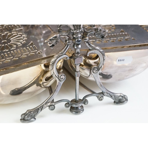 142 - Silver plated folding entrée dish, with cast dragon decoration to the sides, raised on four hoof-lik... 