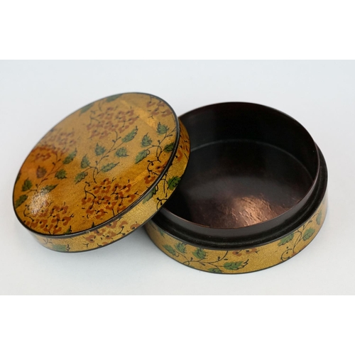 205 - Lacquered circular trinket box, hand painted floral and foliate decoration, diameter approx 8.5cm

P... 