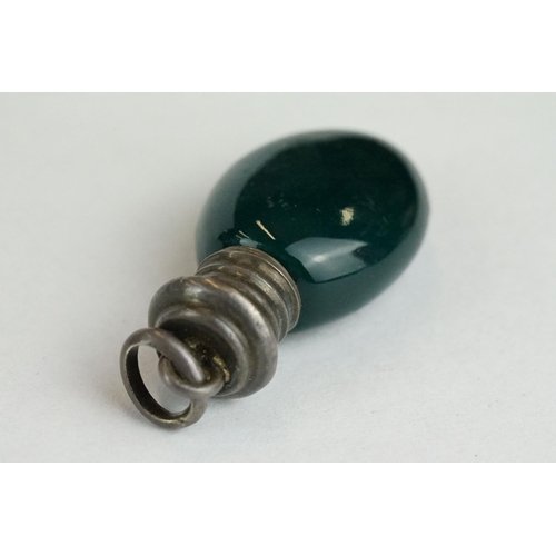 220 - 19th century miniature scent bottle, green porcelain oval body, white metal screw cap, length approx... 