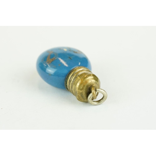 228 - 19th century miniature scent bottle, blue circular body, brass screw top lid, height approx 2.5cm

P... 