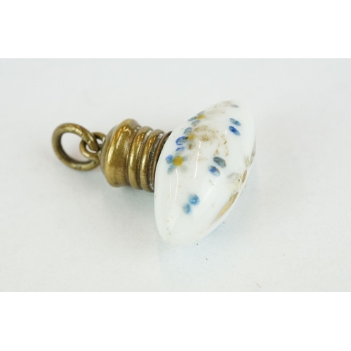 230 - Miniature white porcelain torpedo shaped scent bottle with hand painted forget-me-nots, brass screw ... 