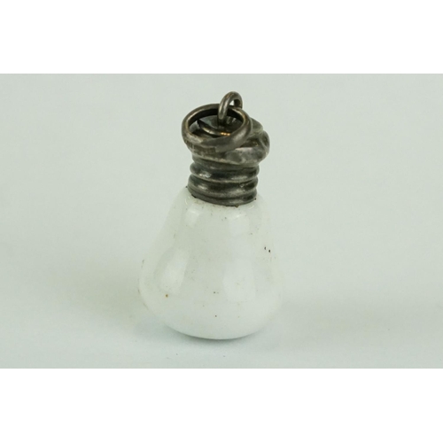 235 - Late 19th century miniature scent bottle of bulb form, white metal screw top lid, length approx 2.5c... 