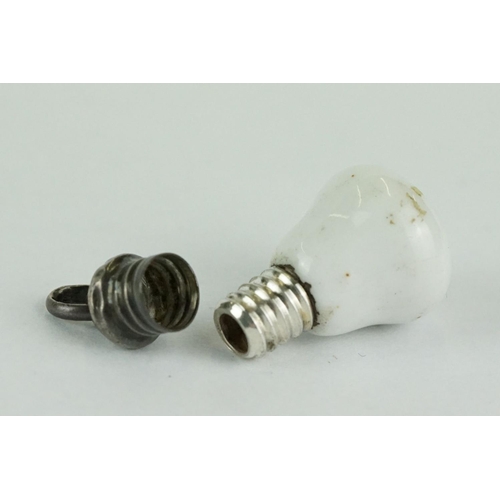 235 - Late 19th century miniature scent bottle of bulb form, white metal screw top lid, length approx 2.5c... 