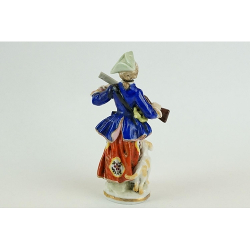 238 - Girl in Swing Chelsea-style scent bottle depicting woman with rifle and dog, the stopper modelled as... 