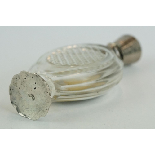 241 - 18th century scent bottle, oval faceted glass bottle with  silver mounts, engraved floral and scroll... 