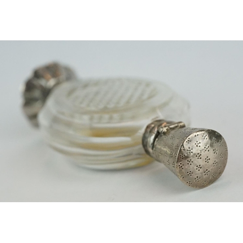 241 - 18th century scent bottle, oval faceted glass bottle with  silver mounts, engraved floral and scroll... 