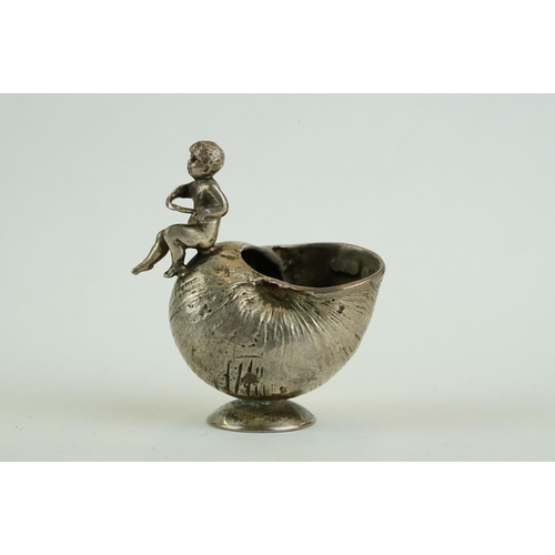 251 - 19th century silver open salt cellar modelled as a footed shell with putti figure, import letter 'F'... 