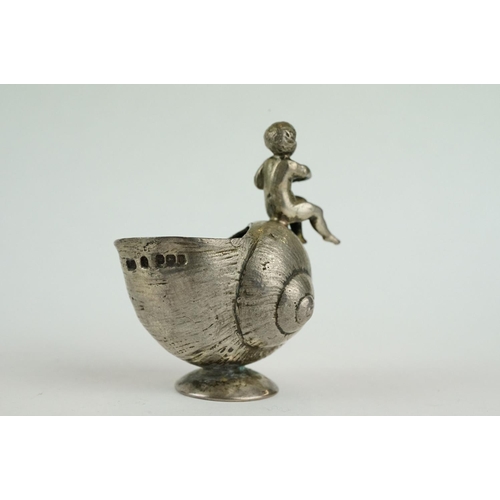 251 - 19th century silver open salt cellar modelled as a footed shell with putti figure, import letter 'F'... 