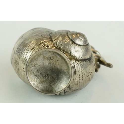 251 - 19th century silver open salt cellar modelled as a footed shell with putti figure, import letter 'F'... 