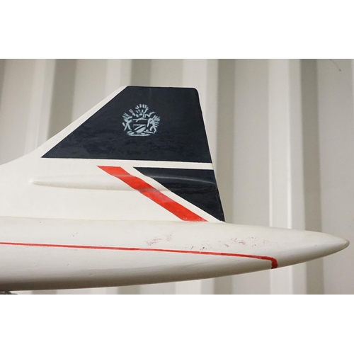 88 - British Airways Concorde - large scratch built painted wooden model, resting on its wheels, approx 1... 