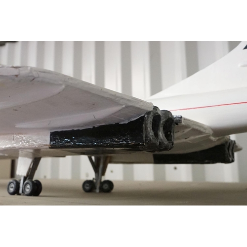 88 - British Airways Concorde - large scratch built painted wooden model, resting on its wheels, approx 1... 