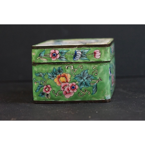 166 - A Chinese enamel box, the rectangular lid with figures beside a tree, 10.5cm