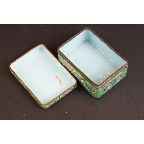 166 - A Chinese enamel box, the rectangular lid with figures beside a tree, 10.5cm