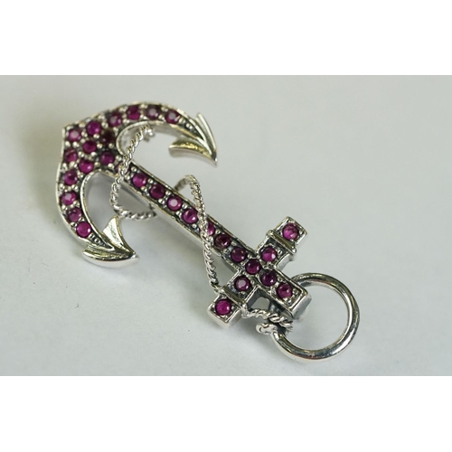 167 - A silver and ruby set anchor style brooch-pendant necklace