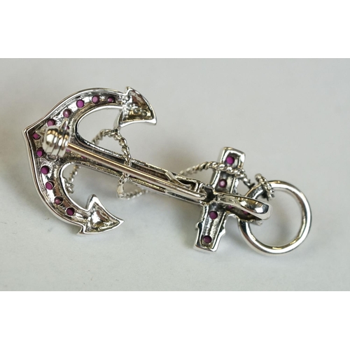 167 - A silver and ruby set anchor style brooch-pendant necklace