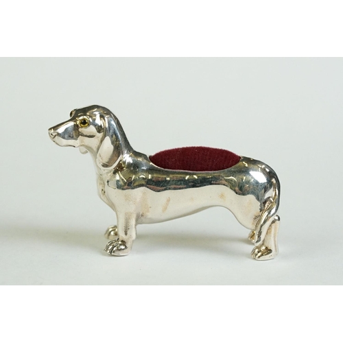 172 - A silver dachshund dog pin cushion