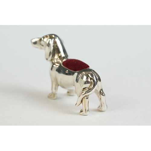 172 - A silver dachshund dog pin cushion