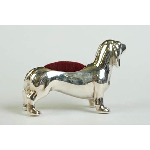 172 - A silver dachshund dog pin cushion