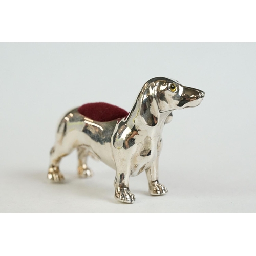 172 - A silver dachshund dog pin cushion