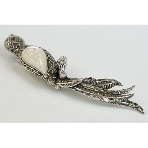 175 - A large silver, marcasite and moonstone pendant-brooch in the form of a parrot