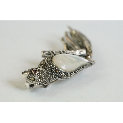 175 - A large silver, marcasite and moonstone pendant-brooch in the form of a parrot